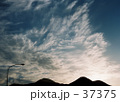 風で広がる秋の雲