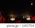 Two chandeliers.