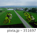 351697