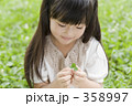 358997