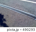 アスファルトの上