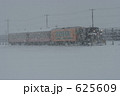 吹雪を走るストーブ列車