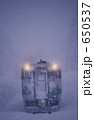 悪天候の塩狩峠を行く気動車