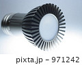 971242