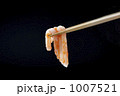 1007521