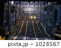 1028567