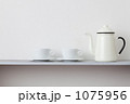 1075956