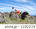 山頂に立つ