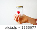 1266077