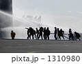 1310980