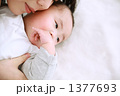 1377693
