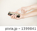 携帯電話と手