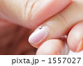 1557027