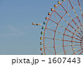 1607443