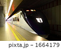 1664179