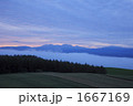 1667169