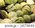1673649