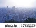 街並みと日の出
