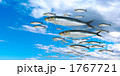 空を飛ぶイワシの群れ　青空　合成