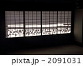 障子に写る枯露柿の影