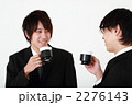 コヒーを飲む二人のビジネスマン