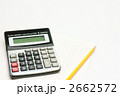 家計簿と電卓と鉛筆