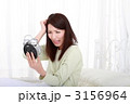 寝坊した女性