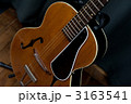 3163541