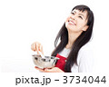 スパチュラを持った女性