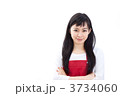 エプロンをした女性