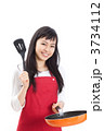 料理をする女性
