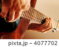 4077702