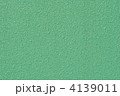 ミントグリーンの壁