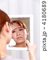 体調の悪い女性