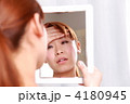 体調の悪い女性