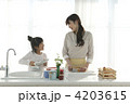 調理する親子