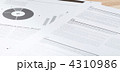 4310986