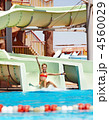 Child on water slide at aquapark. Child on water slide at aquapark.