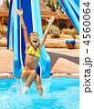 Child on water slide at aquapark. Child on water slide at aquapark.