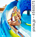 Child on water slide at aquapark. Child on water slide at aquapark.