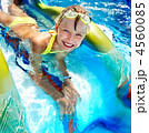 Child on water slide at aquapark. Child on water slide at aquapark.
