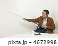 釣竿の手入れをする男性