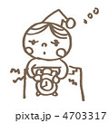 目覚ましで起きる少年