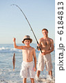 Father fishing with his son Father fishing with his son