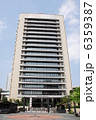 6359387