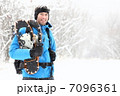 winter snowshoeing man