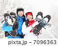 Winter couple outdoors on snowshoes