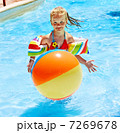Child on water slide at aquapark. Child on water slide at aquapark.