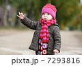 Adorable toddler in an autumn park