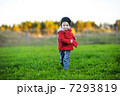 Adorable toddler in an autumn park